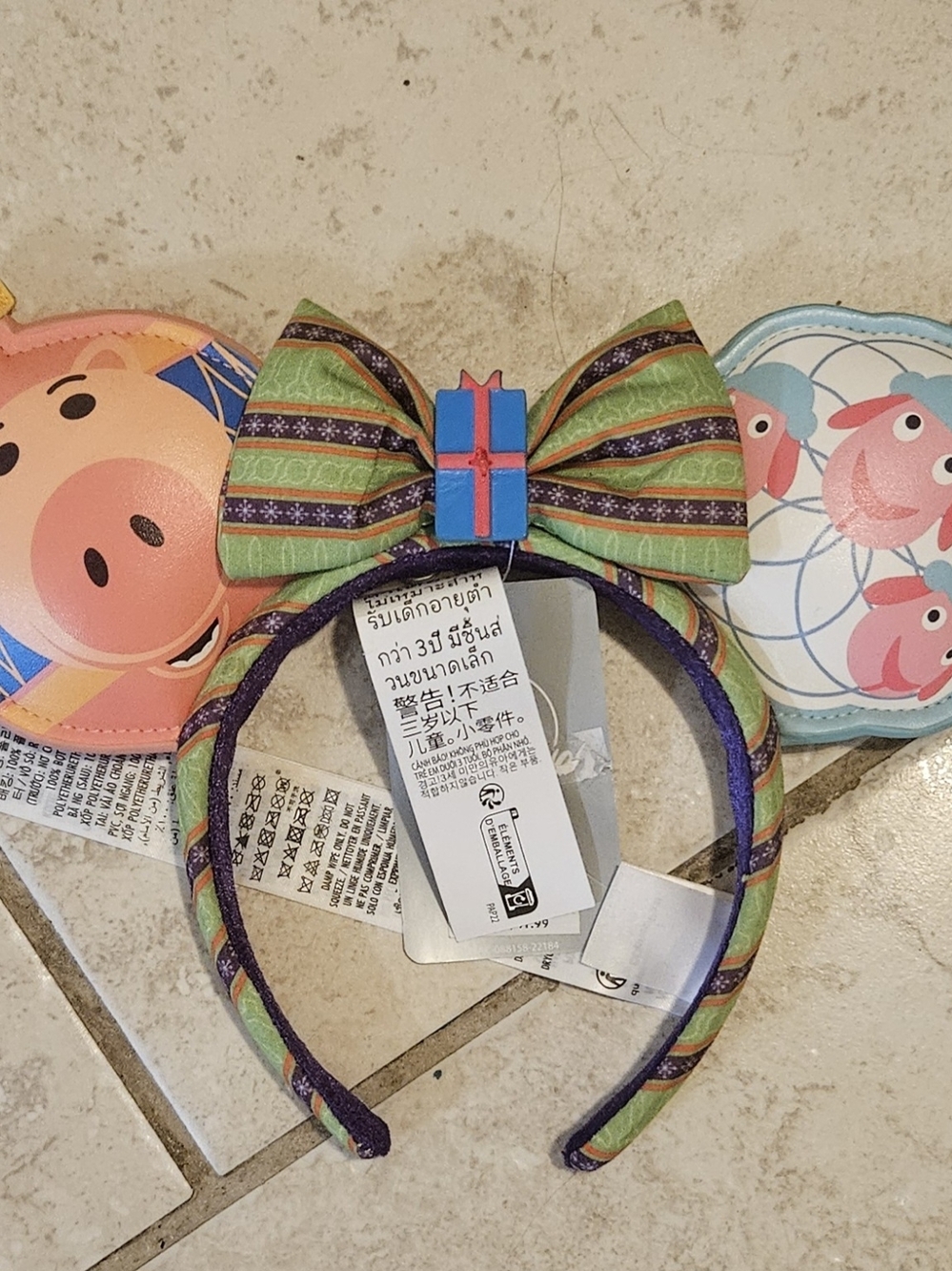 Disney Holiday Minnie Toy Story Bow Headband with Blue Gift Accent